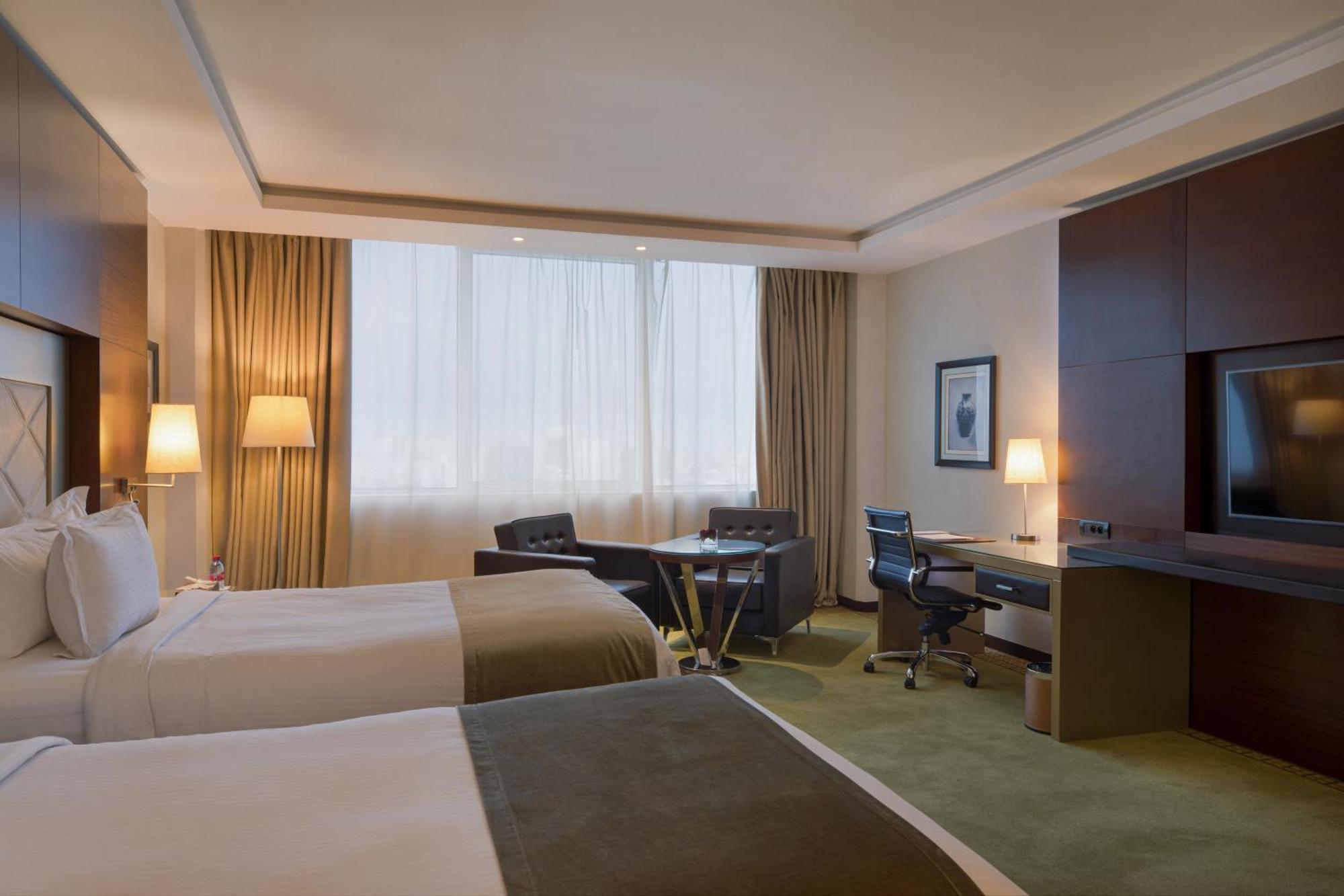 ホテル グランド モガドール シティ センター カサブランカ エクステリア 写真 A room at the hotel
